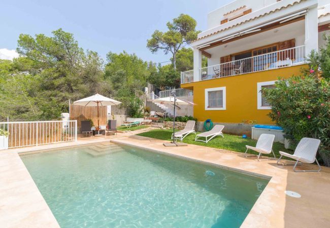 Private swimming pool and garden at Casa Mar in Ibiza