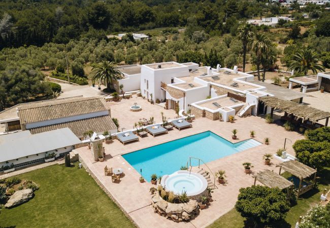 Aerial view of Villa Las Hadas in Ibiza with its pool, terrace, and jacuzzi