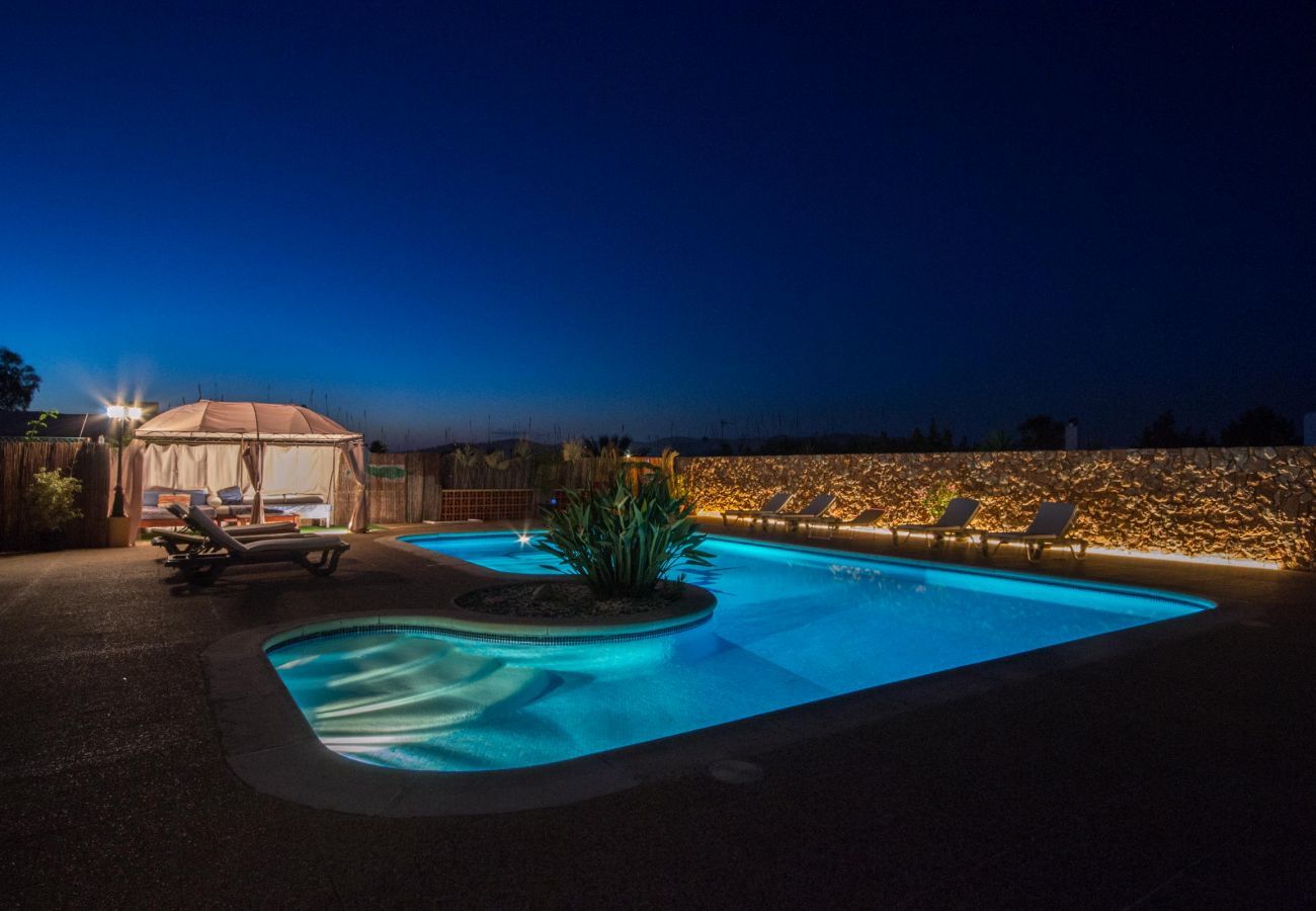 Can Lucia's swimming pool illuminated at night, an ideal place to relax.
