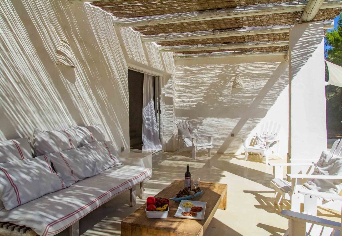 Porch lit at sunset in Can Clay, Ibiza | Eivillas