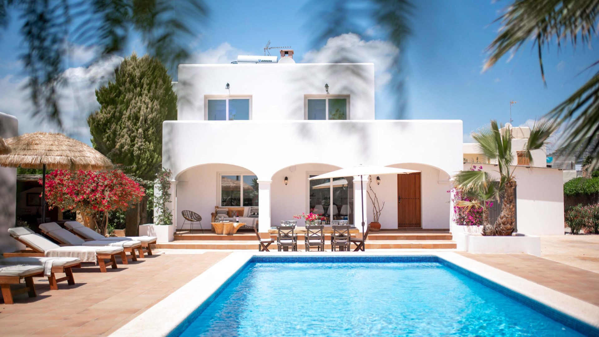 Private pool at Villa Ly with sunbeds and garden – Eivillas