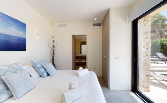Bedroom at Villa Higueras with sea views – Eivillas